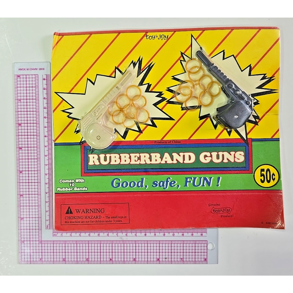 Vintage Vending Display Board Rubberband Guns 0600